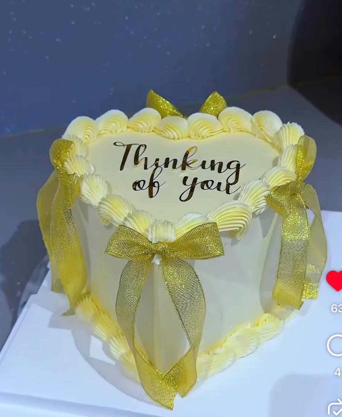 Simple heart cake with ribbons